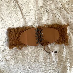Brown frilly corset belt